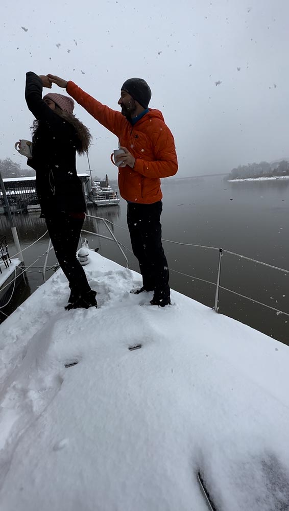 Dancing in the snow on a boat